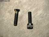 The original bolt on the right and the machined bolt on the left.