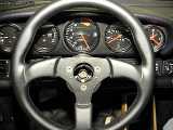 The wheel with the adapter installed in the car.