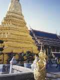 A large gilded supa. A stupa is where the ashes of an important dead person are stored. In this case it's probably someone from the royal family.