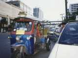 We are about to take a pleasant ride through hot smelly Bangkok in a Tuk Tuk! It is named after the noise it makes.