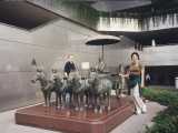 Lily and I are posing in front of the Terra Cotta Warriors museum. This museum contains originals and replicas of the Terra Cotta Warriors of the Qin Dynasty found in Shaanxi, China.