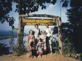 Here we are at the Golden Triangle, on a hill with some children dressed in native hill tribe attire. You can see Myanmar to the left and Laos to the right. China is also just up the river a couple hundred miles.